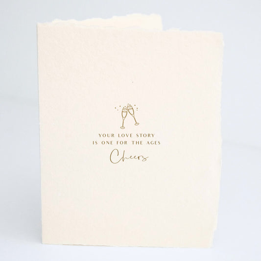 "Your Love is One for the Ages, Cheers" | Wedding Greeting Card - Wellaine